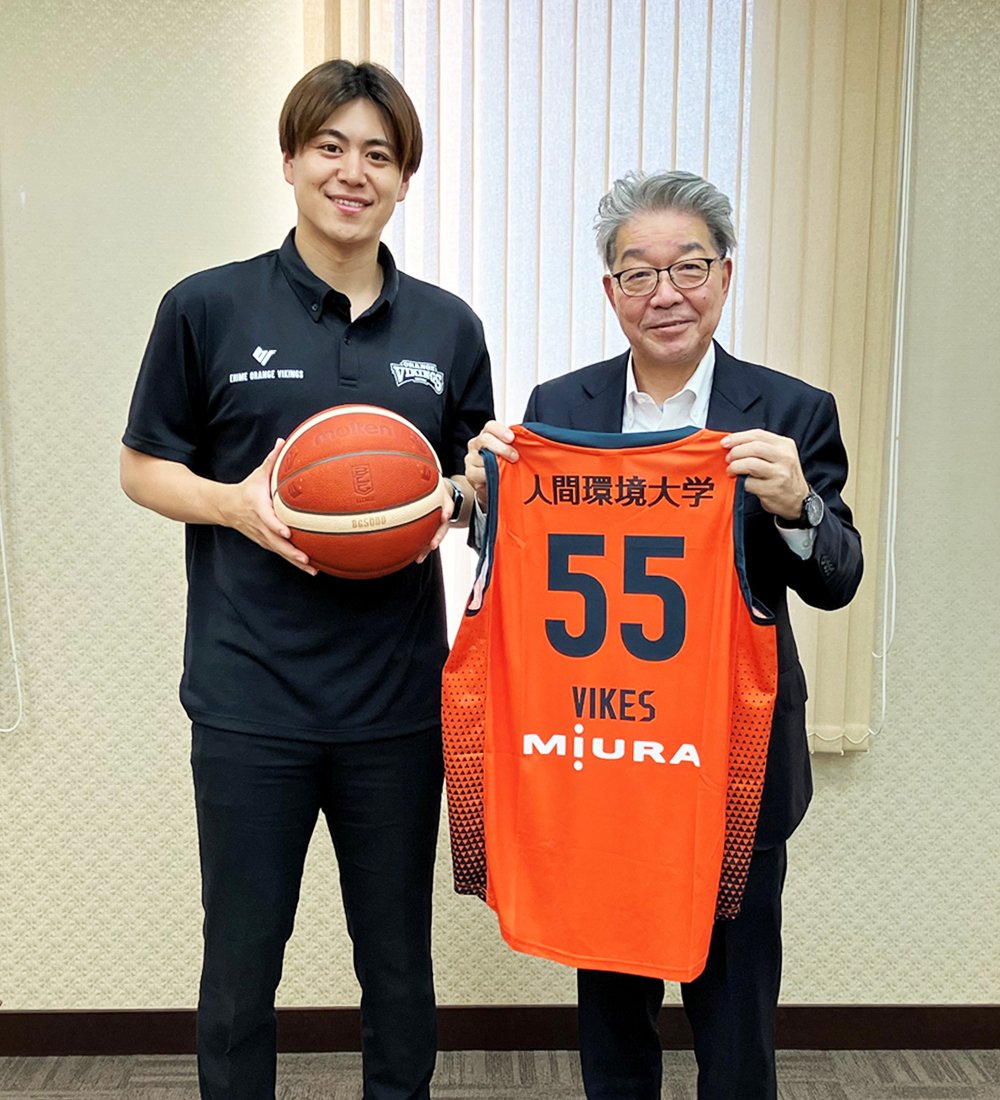 選手と廣井さん.jpg